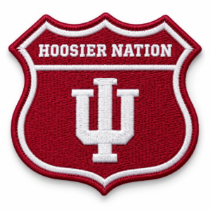 Hoosier Nation embroidered patch with red shield background, white IU monogram and white stitched lettering