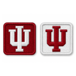 Two IU square embroidered patches in red and white with contrasting monograms and rounded stitched borders
