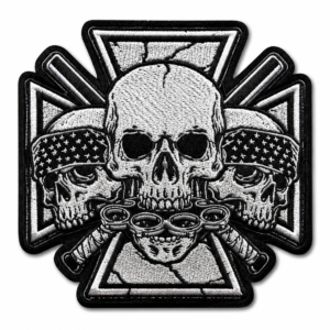 Black and white embroidered skull cross patch with three skulls, crossed weapons, and gothic biker design